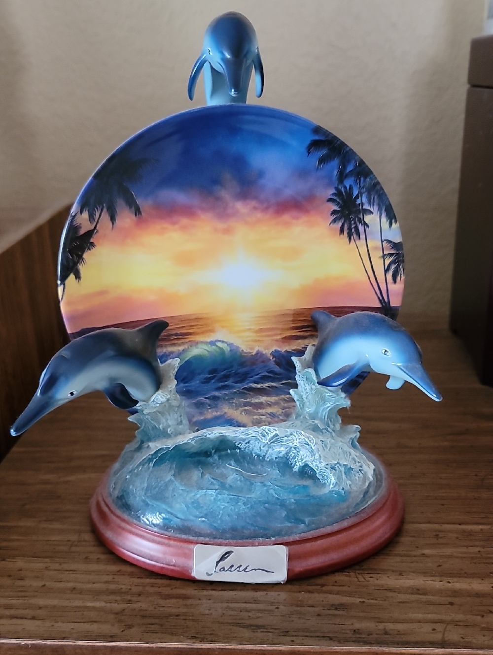 Coastal Blue Dolphin Sculpture with Sunset Seascape